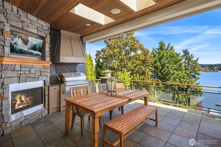 Fire up the grill, catch the game and unwind by the fire - all in a covered outdoor living area designed for all season enjoyment. Fire up the grill, catch the game and unwind by the fire - all in a covered outdoor living area designed for all season enjoyment.