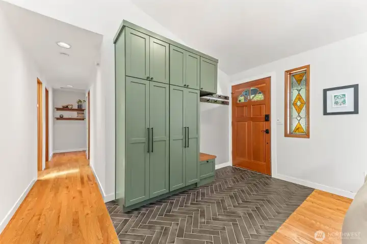 Remodled entry, custom cabinets and Tile flooring