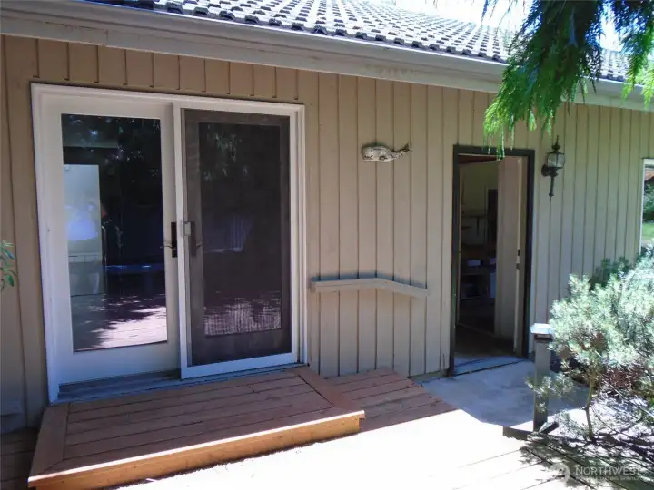 Deck off west side of home
