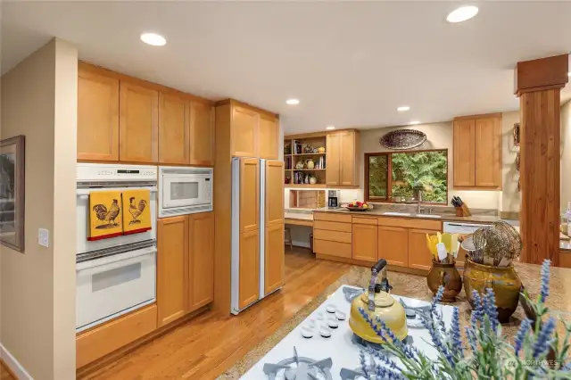 Double ovens, built-in microwave, side X side refrigerator and propane cook-top.