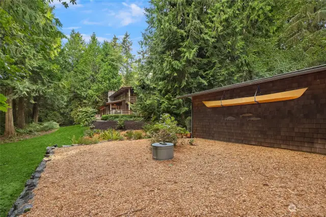 Directly behind the 3-car garage is this level garden area (irrigation ready) for seasonal plantings.