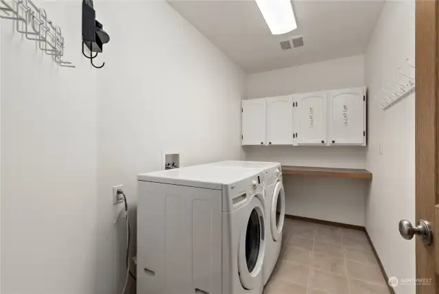 Spacious laundry-room.. Also downstairs!