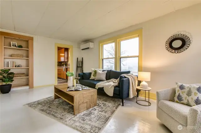 Large living room with built-ins and south-facing windows