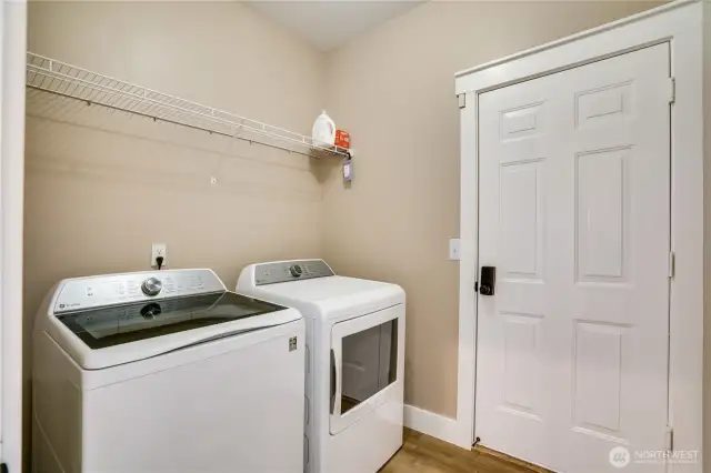 Conveniently situated between the garage and kitchen, the mudroom laundry room is a multi-functional hub. With ample storage space, it’s designed to handle daily chores and keep your home effortlessly organized. The newer washer and dryer stay with this move in ready home.