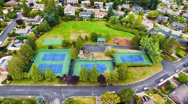 Tennis and pickleball, park with playground.