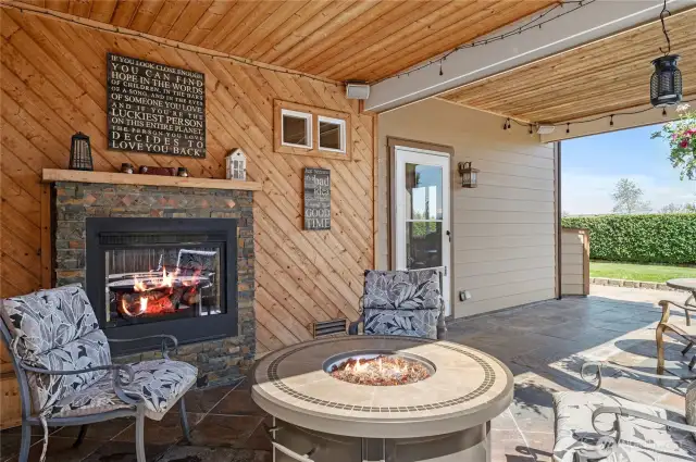 private & covered patio with built-in fireplace overhead heater