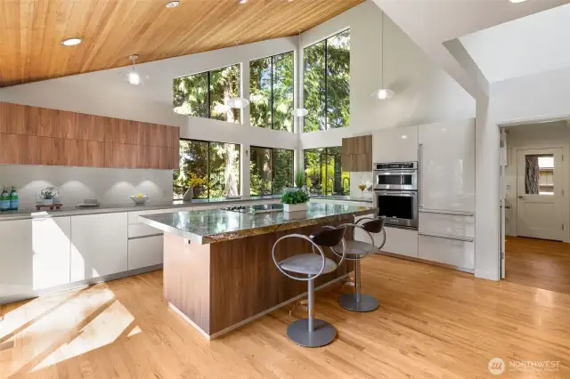 The best place in the whole house - freshly remodeled kitchen: Italian cabinets (Pedini) , beautiful marble counter top, tons of cabinets, buid-in fridge, under cabinets lightening.