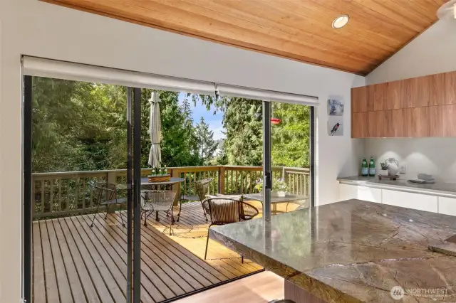 Step out on the deck from the kitchen and dining room to enjoy this lake view.