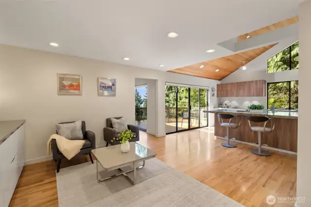 Family room adjacent to kitchen. Build-in cabinets matching kitchen design and provide extra space for pantry and your nice china.
