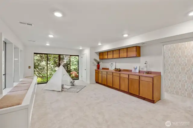 Spacious downstairs area with ADU potential — includes a bedroom, one bathroom, space to add a kitchen, and a separate entrance.