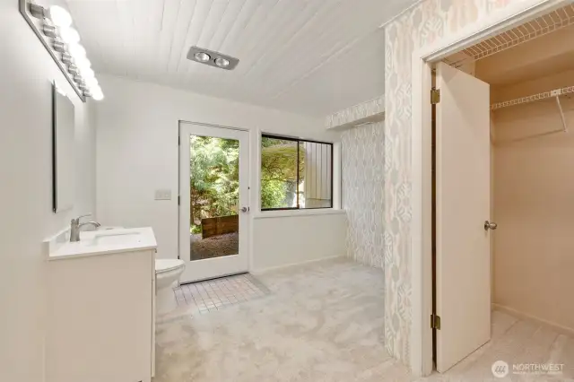 Updated bath downstairs with walk-in closet and separate entrance.