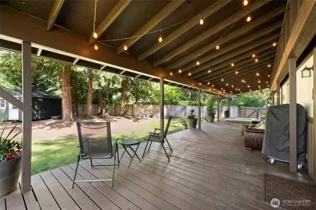 The covered back deck is a true highlight—spacious, private, and perfect for relaxing or entertaining year-round!