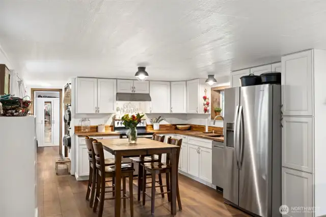 Check out the pantry to the right of the refrigerator!