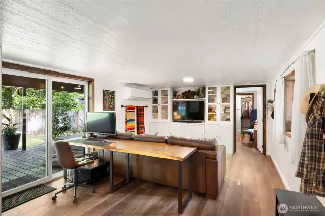 Built in cabinets in the living room & Mini Split A/C and Heating unit for cool summers!