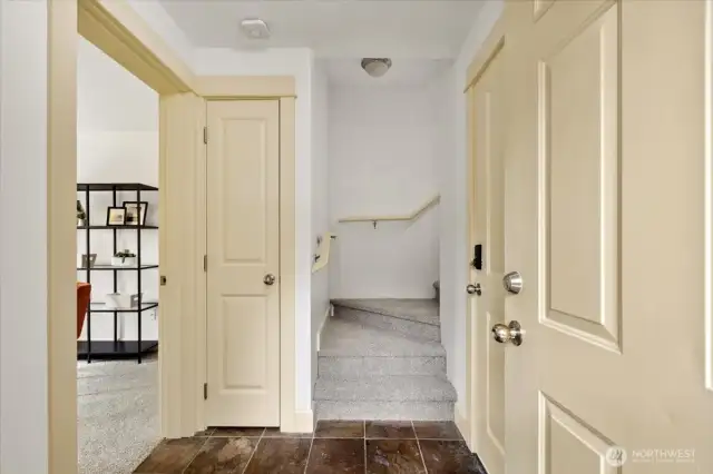 You're greeted by a slate entry off of the attached 1 car garage. Main floor walk-out bedroom connects to the patio (also accessed outside with a gate) with en-suite bathroom