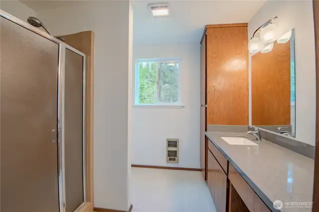 Primary 3/4 bath with spacious vanity