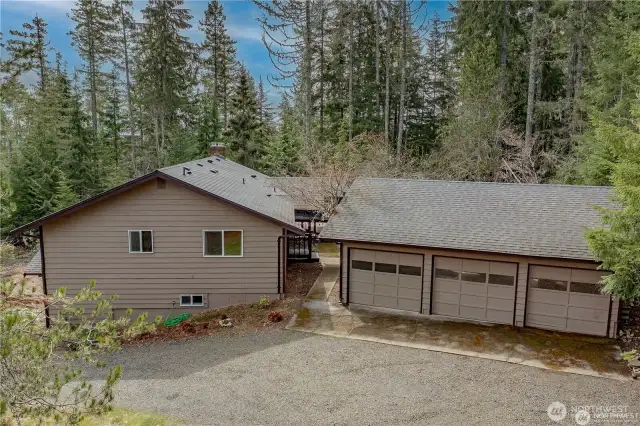 Detached 3 car garage with a covered walkway