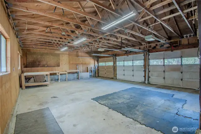 Spacious 3 car garage with plenty of light and shop space