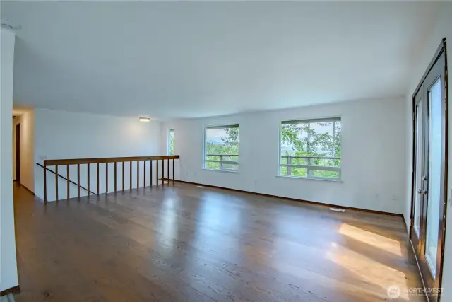 Spacious main level living room with views of Hood Canal and Mount Rainier!