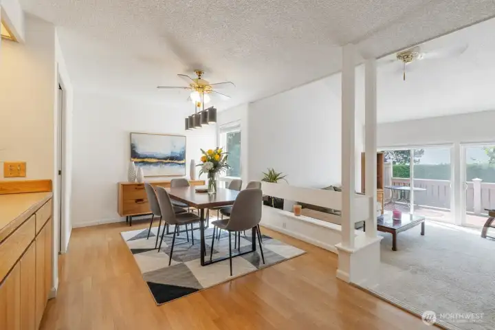 Virtually staged Dining area overlooks the living room area