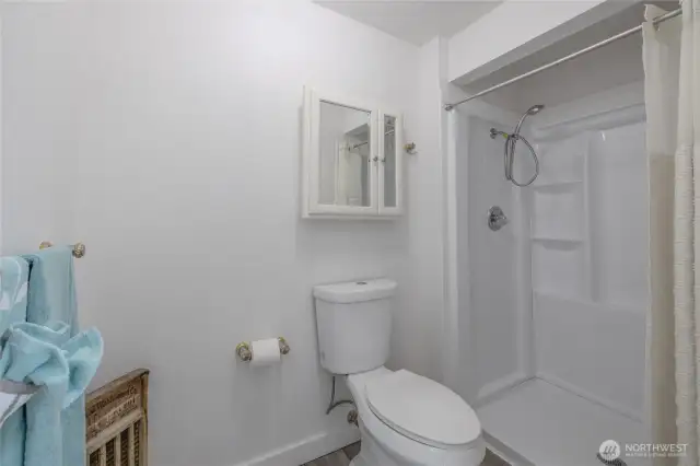 Brand new shower and flooring on the primary bathroom