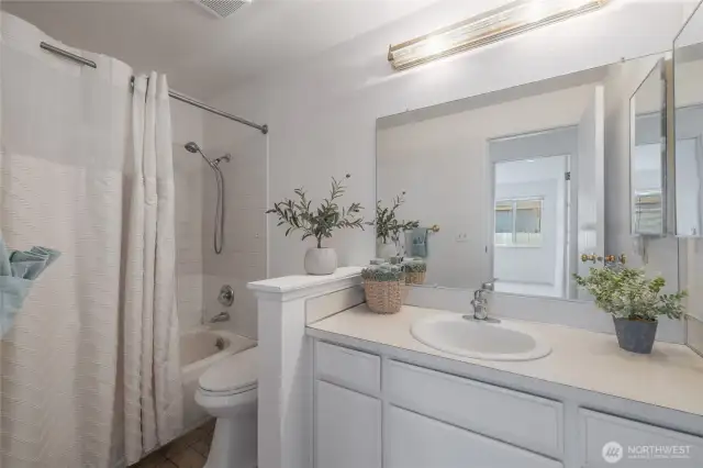 Full sized bathroom with new flooring