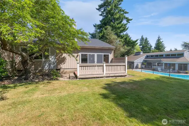 Relax on the deck, grass or swimming pool right outside your door