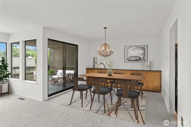 Virtual Staged Dining room and sliding doors to deck.