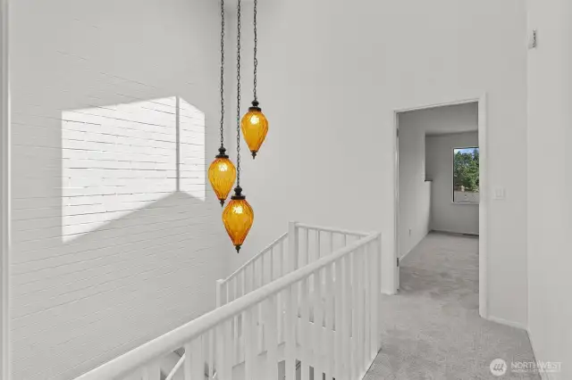 Original mid-century light fixture over staircase.