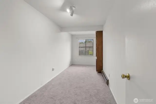 Lower level bonus room. This has been used as an office.