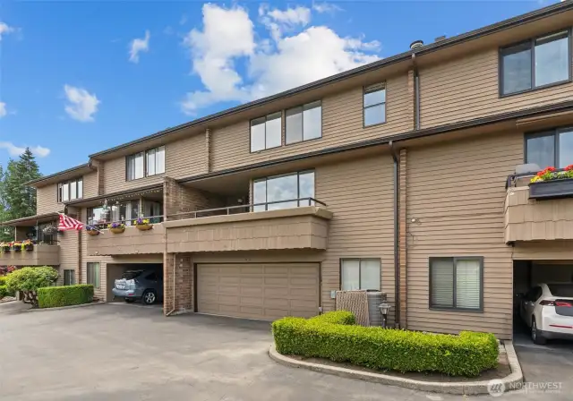 Back of unit where the 2 car garage and deck are located