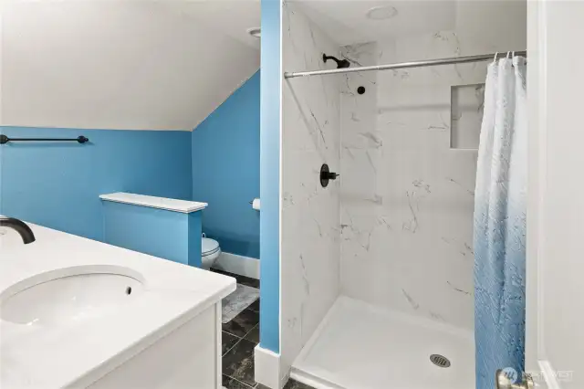 Walk in shower in primary bathroom