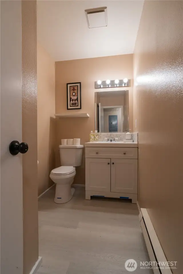 Guest Bathroom in the main floor with new vanity & new Toilet.