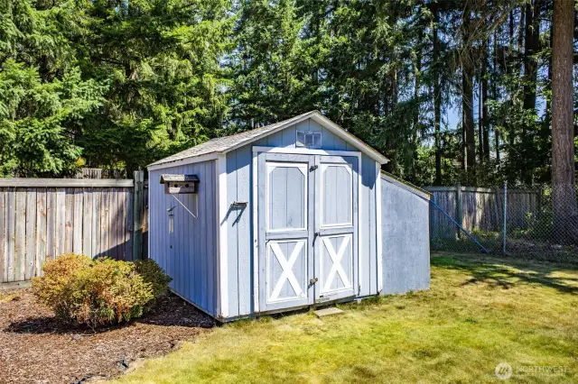 There's extra storage for garden supplies in the shed.