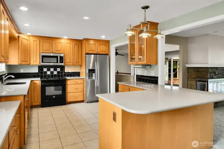 Kitchen eating space around large island.