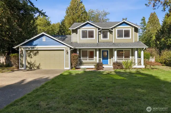 In a beautiful setting, with a long driveway out front for plenty of parking.