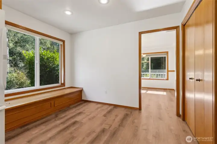 Cozy breakfast nook with storage bench. Your pantry on the right.