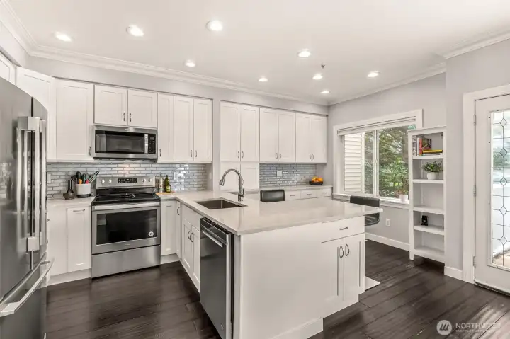 Beautifully updated kitchen with custom storage & stainless steel appliances