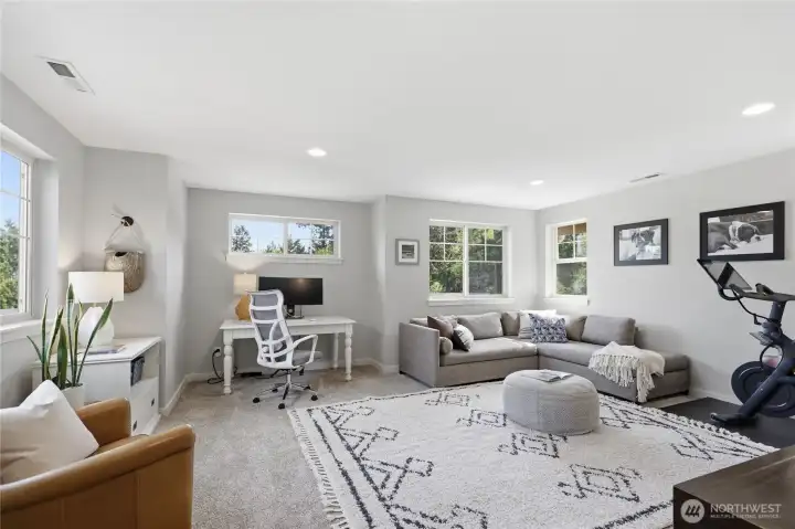Opening onto the loft is a bonus room, now being used as an office