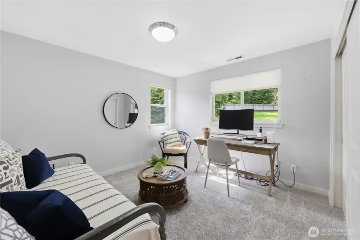 Upstairs bedroom, off the loft and next to a full bathroom.  Look out over backyard