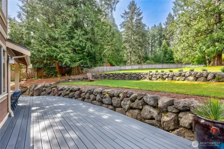 From the kitchen area of the deck with view of the rockery and yard.