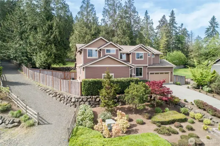 Distant picture of the home with the easement to the side