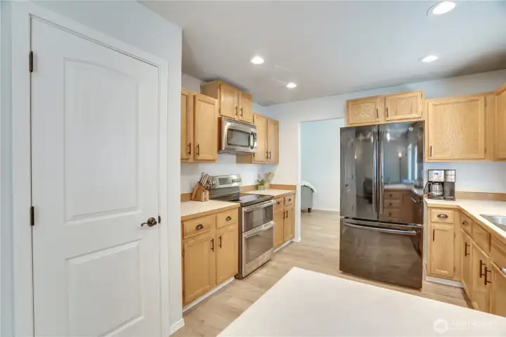 Welcome to the heart of the home! This gourmet kitchen has it all! Stainless appliances, stylish hardware, ample counter space and a walk-in pantry for your dried goods and kitchen gadgets!