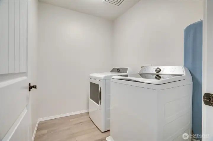 The laundry room is conveniently located upstairs as well - no hauling heavy laundry bins up and down the stairs! This is what home dreams are made of!