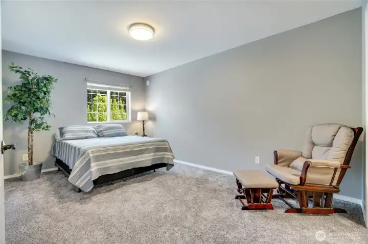 The fourth and final bedroom is slightly smaller than the third bedroom, but this one features a walk-in closet!