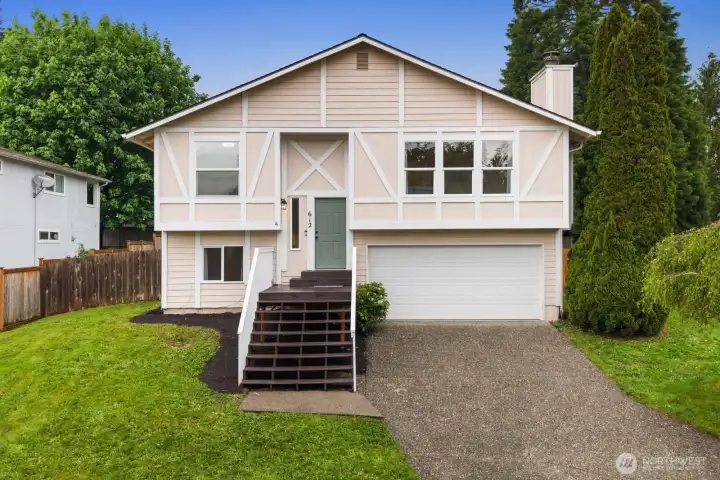 Charming home with great curb appeal and a welcoming entry, featuring a spacious two-car garage in the sought-after Blackmans Lake View neighborhood.