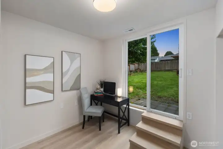 Flexible space for office or study with direct access to backyard.