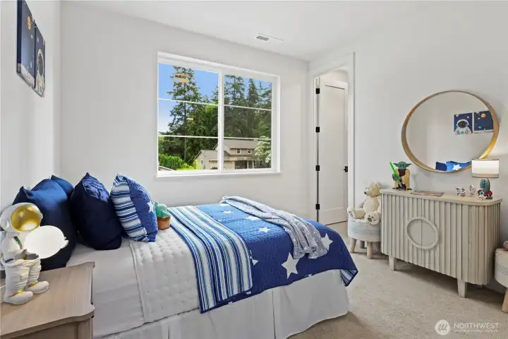 Another angle of the upstairs ensuite bedroom looking toward the ensuite bathroom.