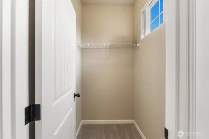 Walk in closet in second guest bedroom.