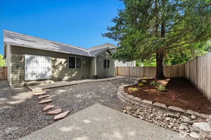 Beautifully landscaped back yard with dedicated sprinkler system.